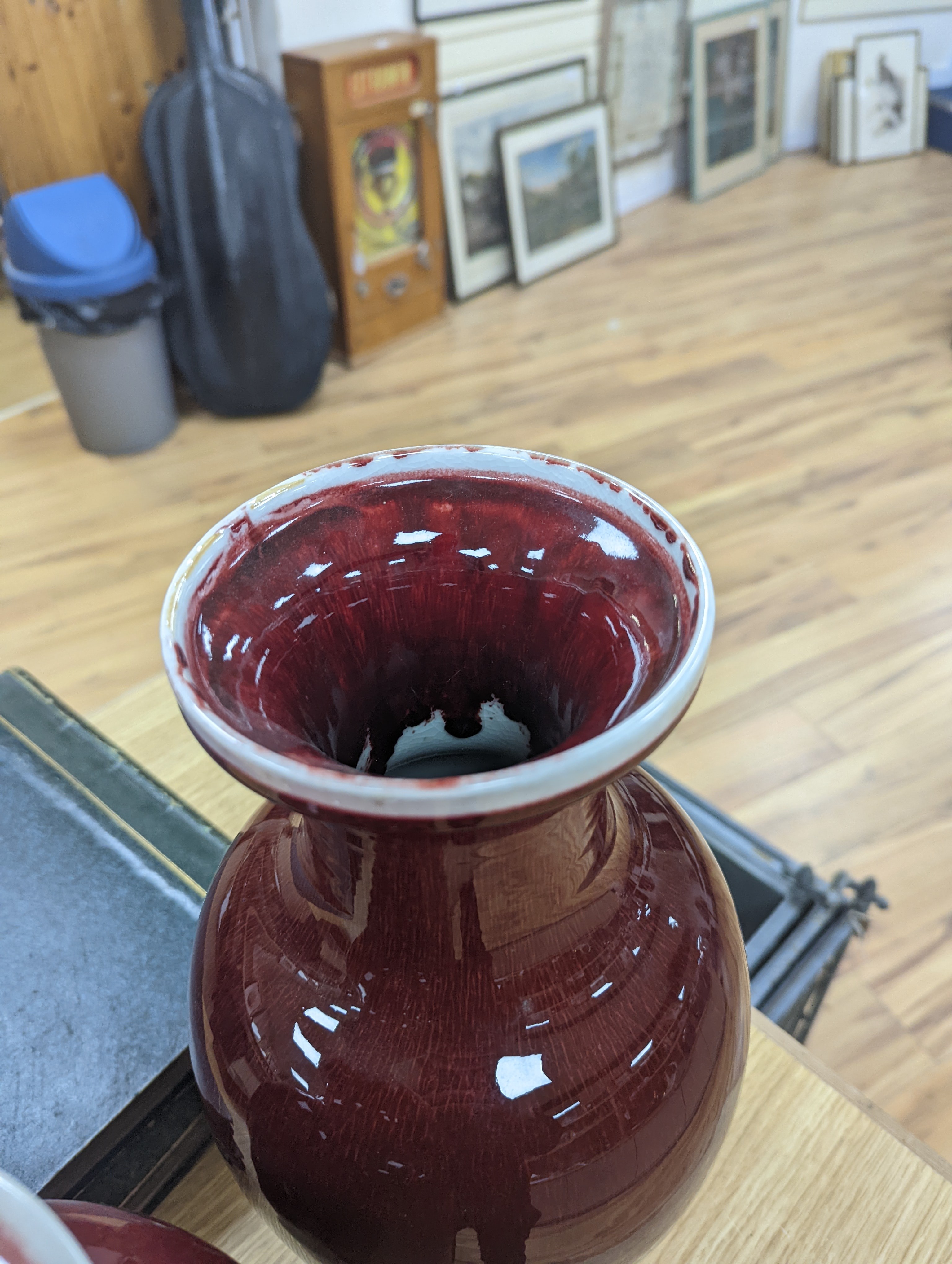Two large Chinese sang de boeuf glazed vases tallest 36cm